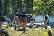 REENACTMENT - While NTSB Investigator Joe Sedor (played by Jason Faulkner) makes preliminary notes, NTSB Crash Investigators secure the Black Box, a crucial piece of evidence that will help determine what downed Comair Flight 5191. (Cineflix/Darren Goldstein) REENACTMENT - While NTSB Investigator Joe Sedor (played by Jason Faulkner) makes preliminary notes, NTSB Crash Investigators secure the Black Box, a crucial piece of evidence that will help determine what downed Comair Flight 5191. (Cineflix/Darren Goldstein)