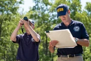 REENACTMENT - NTSB Investigator Joe Sedor (played by Jason Faulkner) reviews his notes, while a NTSB Crash Investigator takes photographs to help determine what caused Comair Flight 5191 to crash. (Cineflix/Darren Goldstein)