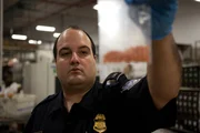 Customs and Border Protection officer Antonio Condello investigates suspicious products in the airport mailroom. Customs and Border Protection officer Antonio Condello investigates suspicious products in the airport mailroom.