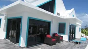 Back space and exterior of I. Land Time house in Providenciales, Turks and Caicos as seen on HGTV's Caribbean Life
