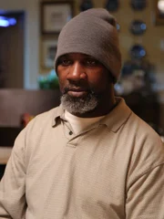 Former inmate of the convict William Price listens to Fatima Silva’s questioning in a local cafe. Former inmate of the convict William Price listens to Fatima Silva’s questioning in a local cafe.