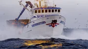 Northwestern cuts through small waves.