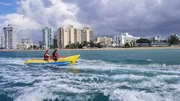 The clients enjoying a wild boat ride, as seen on HGTV's Caribbean Life.