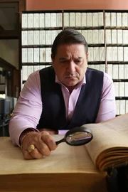 Steve DiSchiavi pours over the archives in the local library as seen on Travel Channel's The Dead Files. Steve DiSchiavi pours over the archives in the local library as seen on Travel Channel's The Dead Files.