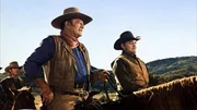 l-r: John Simpson Chisum (John Wayne), James Pepper (Ben Johnson)