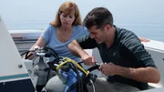 Rob Nelson and Valerie Van Heest prepare for their dive to a shipwreck that could be the lost cargo vessel, the Thomas Hume.