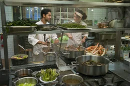 Hassan (Manish Dayal, l.); Marguerite (Charlotte Le Bon, r.)