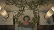 BALTIMORE, MD.- Kathy Conneally in bed with vines.