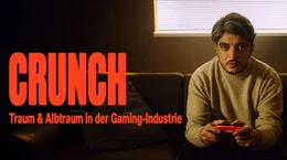 S&Uuml;DWESTRUNDFUNK Crunch &ndash; Traum und Albtraum in der Gaming-Industrie - In &bdquo;Crunch&ldquo; erz&auml;hlen Entwickler:innen nicht nur von ihrer Liebe zu Games &ndash; sondern auch von den oft ausbeuterischen Strukturen in der gr&ouml;&szlig;ten Unterhaltungsindustrie der Welt. Was kostet der Erfolg von Videospielen?: Host Khesrau Behroz sitzt mit Videospiel-Controller auf dem Sofa. &copy; SWR, honorarfrei - Verwendung gem&auml;&szlig; der AGB im engen inhaltlichen, redaktionellen Zusammenhang mit genannter SWR-Sendung und bei Nennung "Bild: SWR" (S2+). SWR Presse/Bildkommunikation, Baden-Baden, Tel: 07221/929-22202, foto@swr.de
