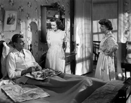 Als nach Jahren Charlie Oakley (Joseph Cotten, l.) urpl&ouml;tzlich seine Schwester (Patricia Collinge, r.) besucht, ahnt er nicht, dass seine kluge Nichte Charlotte (Teresa Wright, M.) ihn schon bald durchschaut ...