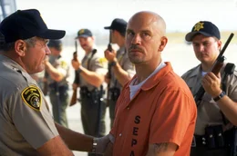 Cyrus 'The Virus' Grissom (John Malkovich)
