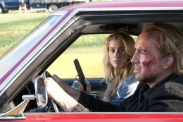 Piper (Amber Heard), Milton (Nicolas Cage)