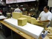 Mauro and Frankie work on building the Sesame St. buildings out of cereal treats.