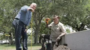 Josh and Coy Lothrop dig for treasure at White Point Gardens in Charleston, South Carolina.