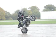 ESSEX, U.K. - To stay balanced, both riders must make sure their combined center of mass lies over the center of force.