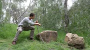 Episode 104 Rattlesnake and Sinking Car. Bear Grylls pointing at rattlesnake.