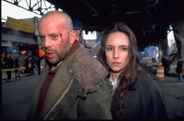 James Cole (Bruce Willis) and Dr. Kathryn Railly (Madeleine Stowe)