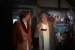 L-R: Charles Dickens (Dan Stevens) and Scrooge (Christopher Plummer)