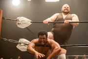 (l-r) Joseph Lee Anderson as Rocky Johnson, Patrick Cox as Crusher Yurkov