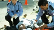 Paramedics and Faustos Santos helping a wounded Chester. Paramedics and Faustos Santos helping a wounded Chester.