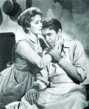 L-R: Hallie Stoddard (Vera Miles), Ransom Stoddard (James Stewart)