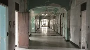 Interior look of a corridor in the Trans Allegheny Lunatic Asylum in West Virginia. As seen on Travel Channel's Portals To Hell. Interior look of a corridor in the Trans Allegheny Lunatic Asylum in West Virginia. As seen on Travel Channel's Portals To Hell.