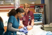 CHICAGO MED – "Bound" Episode 106 – (l-r) Yaya DaCosta as April Sexton, Nick Gehlfuss as Dr. Will Halstead