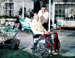 Der besessene Hypochonder Georg Kimball (Rock Hudson, vorne)  h&ouml;rt zuf&auml;llig mit an, wie sein Arzt &uuml;ber den bevorstehenden Tod eines seiner Patienten spricht. In dem Glauben, selbst das Opfer zu sein, sucht er Hilfe bei seinem Freund und Nachbarn Arnold (Tony Randall, hinten) ...