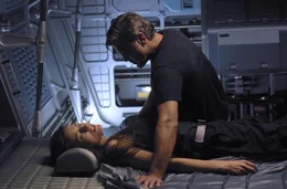 SD-963 Chris Kelvin (George Clooney) ponders the shocking appearance of his beloved wife Rheya (Natascha McElhone) aboard a space station. Not for sale or duplication.
