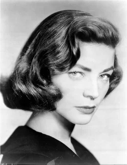 Lucy Moore (Lauren Bacall). Die Sch&ouml;ne aus dem Vorzimmer des New Yorker B&uuml;ros der Headleys bestimmt das Schicksal zweier M&auml;nner.