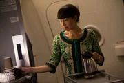 REENACTMENT - A Malaysia Airlines flight attendant (played by a background performer) goes about her regular duties on Flight 370. REENACTMENT - A Malaysia Airlines flight attendant (played by a background performer) goes about her regular duties on Flight 370.