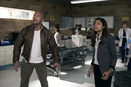 Davis Okoye (Dwayne 'The Rock' Johnson), Dr. Kate Caldwell (Naomie Harris).