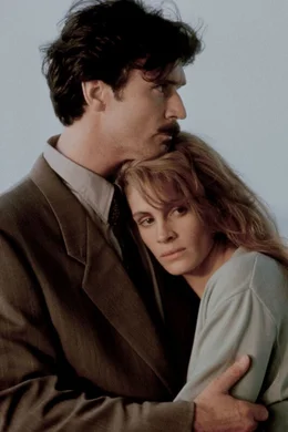 L-R: Martin Burney (Patrick Bergin) und Laura Burney (Julia Roberts)