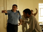 Prison guard trying to control the inmates. Grant County Jail is known for its large gang presence and outbreaks of violence. Prison guard trying to control the inmates. Grant County Jail is known for its large gang presence and outbreaks of violence.