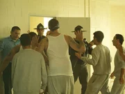 Police break up the riot inside the prison. Police break up the riot inside the prison.