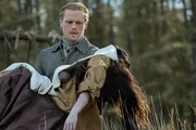 Outlander – Staffel 6, Folge 7. Sam Heughan als Jamie Fraser, Jessica Reynolds als Malva Christie.
