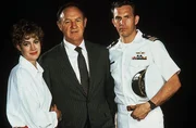 L-R: Susan Atwell (Sean Young), David Brice (Gene Hackman) und Tom Farrell (Kevin Costner)