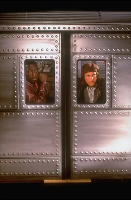 Wesley Snipes (l),  Woody Harrelson (r)