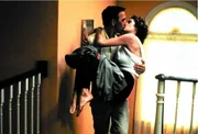 l-r: Tom Farrell (Kevin Costner), Susan Atwell (Sean young)