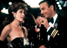 L-R: Susan Atwell (Sean Young) und Tom Farrell (Kevin Costner)