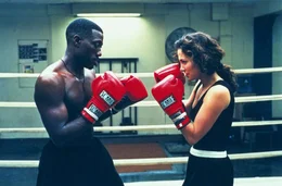 John (Wesley Snipes) und Grace Santiago (Jennifer Lopez) sind neue Kollegen und freunden sich an.