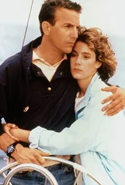 L-R: Tom Farrell (Kevin Costner) und Susan Atwell (Sean Young)