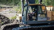 Buzz Legault working in excavator