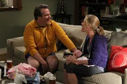 Cameron Tucker (Eric Stonestreet), Claire Dunphy (Julie Bowen).