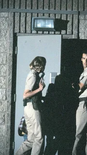 Harmon Rabb, Jr. (David James Elliott), Meg Austin (Tracy Needham)