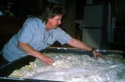 Richard Noll looks over the Skookum cast of Bigfoot's print. Richard Noll looks over the Skookum cast of Bigfoot's print.