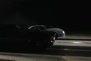 The Deathtrap catches air as Chuck guns it off the light.