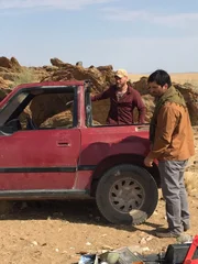 Grady Powell and Bill MConnell checking out the vehicle in the Namib Desert.