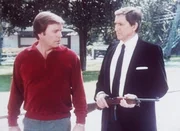 Jonathan (Robert Wagner, l.) ist es gelungen, den international gesuchten Goldräuber Noel Teppman (Cesare Danova, r.) ausfindig zu machen. Ist er verantwortlich für den Hanteltrick? Jonathan (Robert Wagner, l.) ist es gelungen, den international gesuchten Goldräuber Noel Teppman (Cesare Danova, r.) ausfindig zu machen. Ist er verantwortlich für den Hanteltrick?