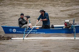 Mitchell Long Filming Forrest Galante In A Small Boat.